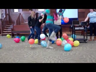students stomp to pop bunch of balloons