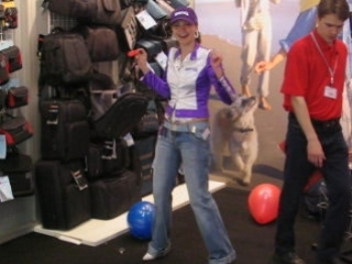 girl cleans up balloons at a store